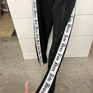 Fake News Black Mesh Pants